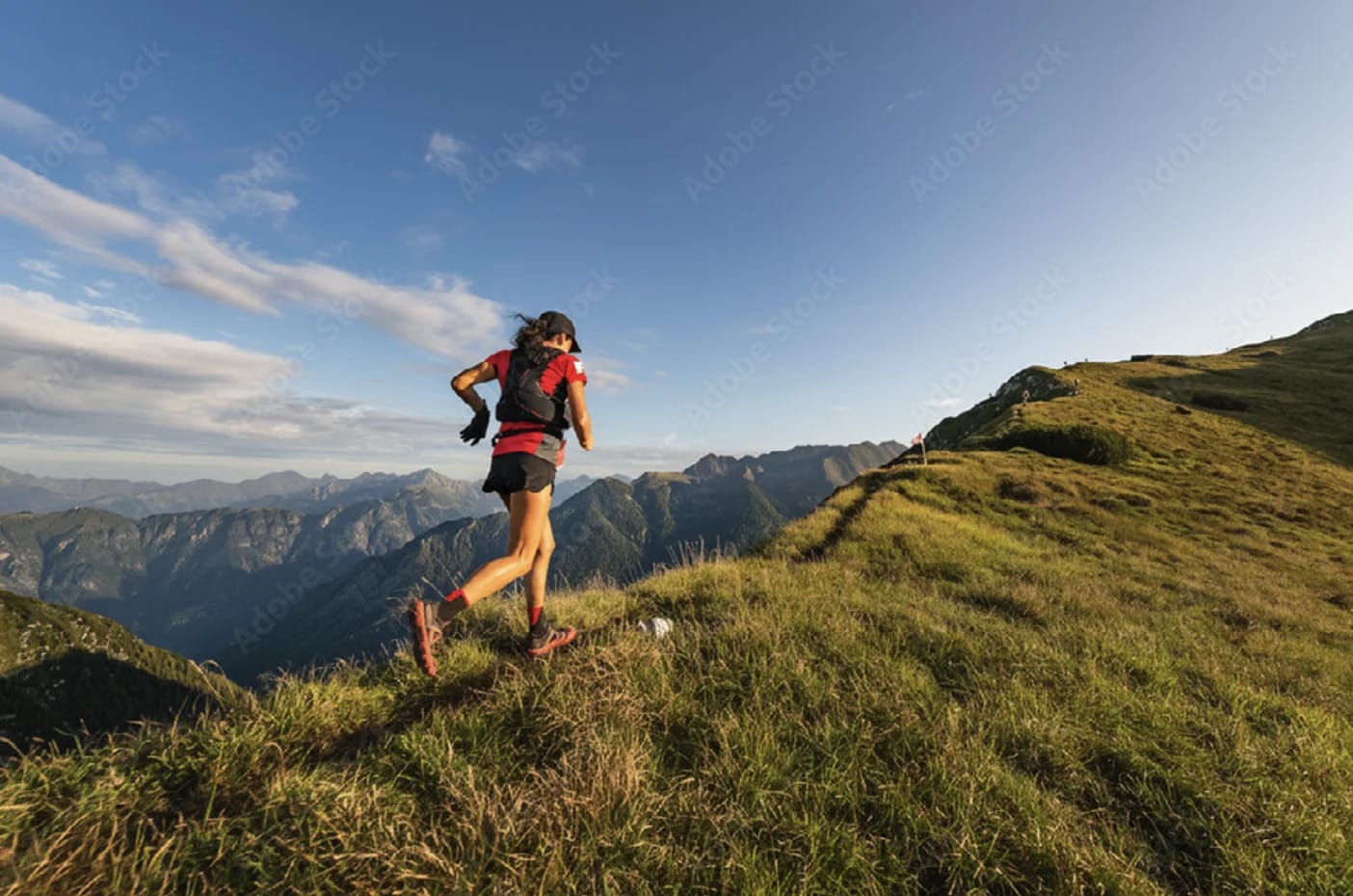 Alpine ridgelines under open sky — temporary stand-in for skiing